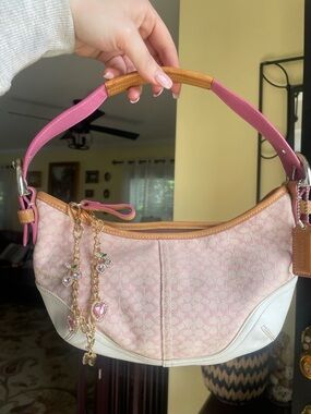 Coach Pink Signature Canvas Shoulder Bag with Tan Trim and Charm